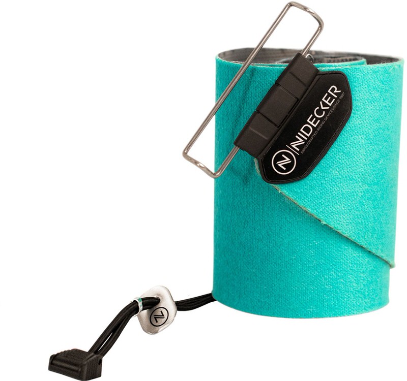 Turquoise splitboard skins Rolled up, turquoise Nidecker Escape Splitboard Skins with fastening elements.