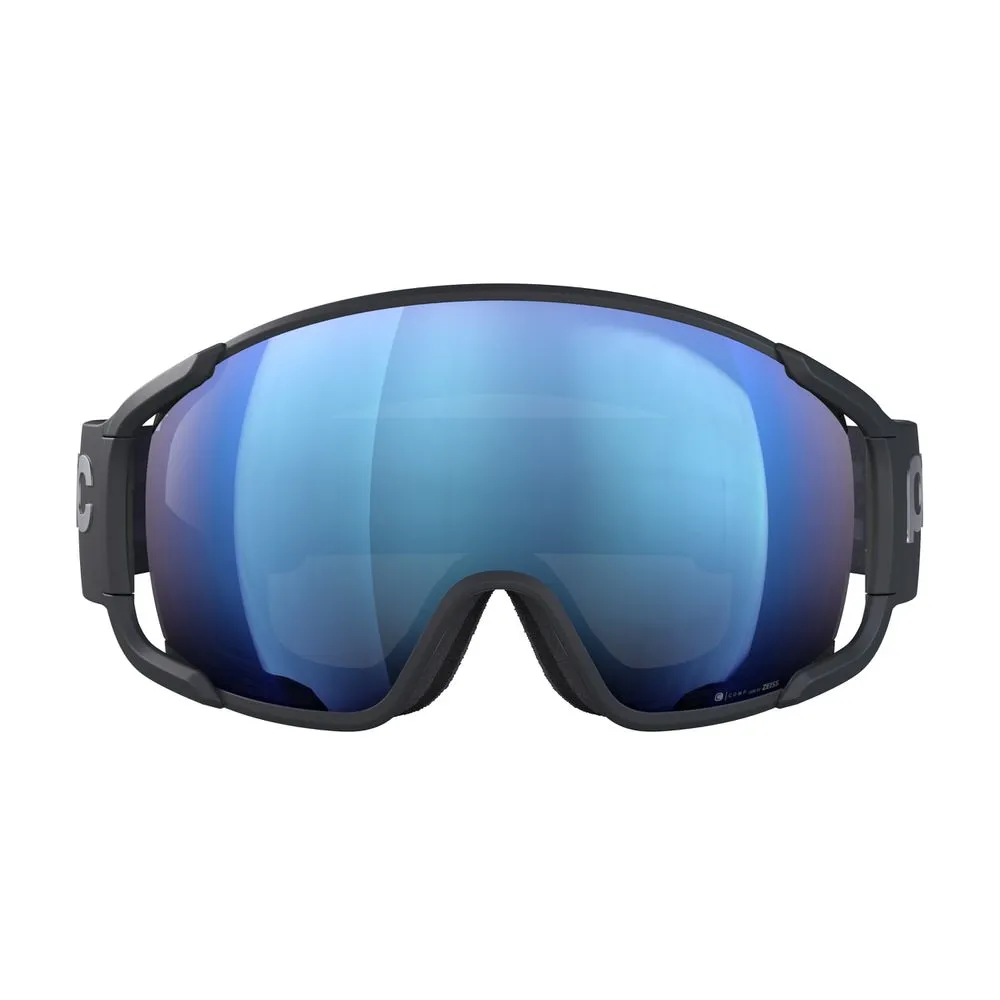 Ski goggles with a large, bluish lens and dark gray frame against a white background.