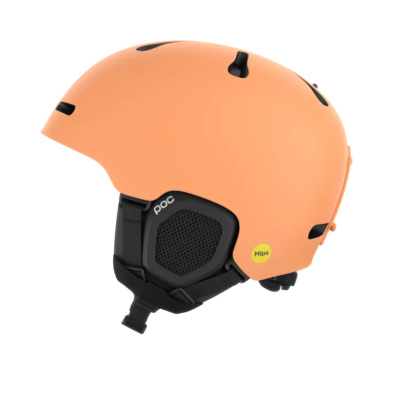 POC Marker ski helmet in peach color, side view with black details and ear protection, isolated against a white background.